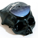 Illustration for article titled Melting Vinyl Records into Skulls Is Hauntingly Beautiful